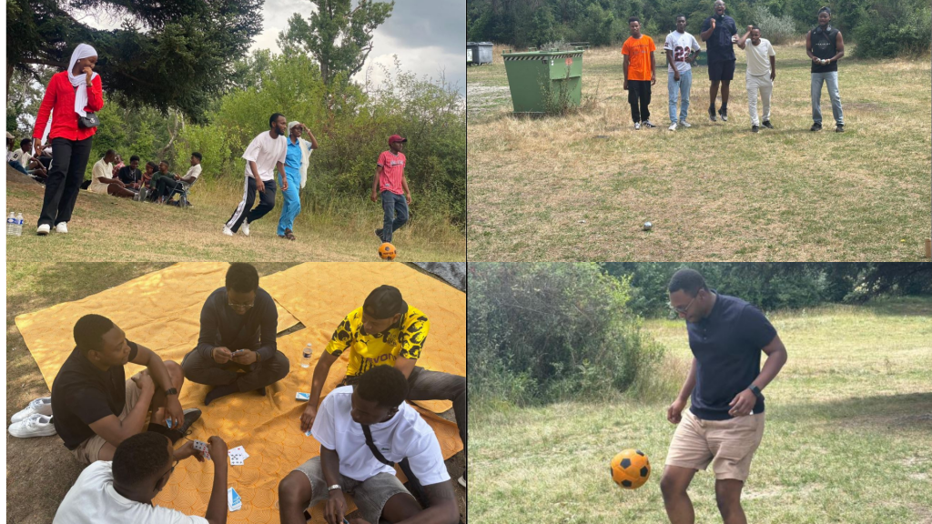Des membres jouant aux cartes, au foot et à la pétanque à l'occasion du Barbecue annuel AJEGUIR 2025 au parc de Miribel-Jonage Rhône